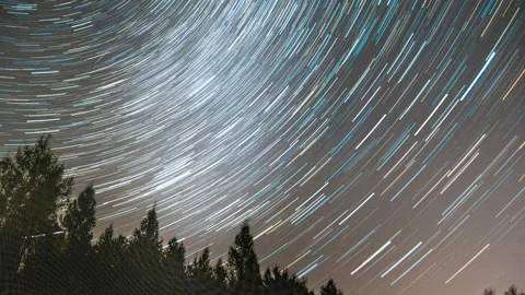 Beautiful startrail time lapse. Trails of stars over forest. Stock Footage 160674840