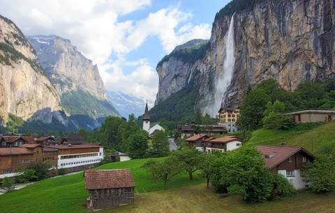Beautiful Staubbachfall waterfall flowing down the picturesque Lauterbrunnen Stock Photos