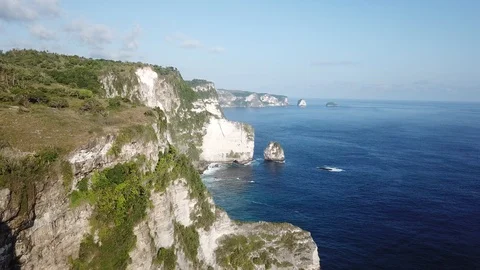 Beautiful Steep Cliffs in the Ocean [Drone Footage] Stock Footage 96295097