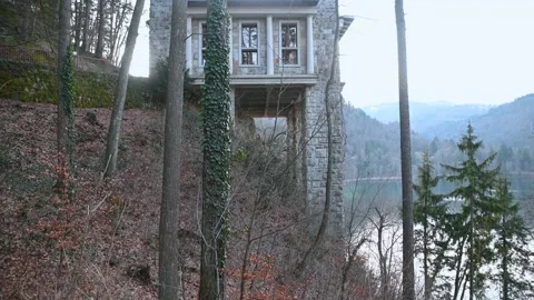 Beautiful stone pavilion on high pillars above lake Bled Stock Footage 150577251