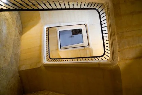 Beautiful stone rectangular staircase in classic house in view from the botto 스톡 사진