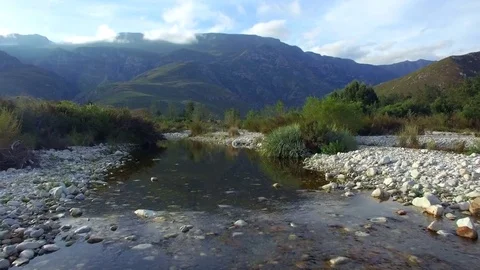 Beautiful Stone Skipping in River Valley Stock Footage 79741599
