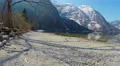 Beautiful stony lakeside in Austrian Alps, mountain lake, low season at resort 4k or 4k+ Resolution