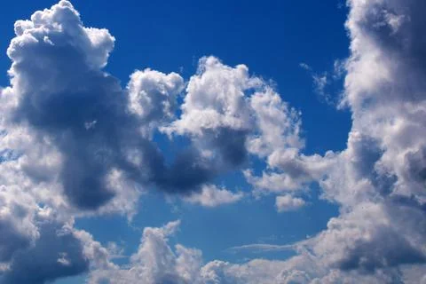 Beautiful storm clouds on the blue sky. An approaching storm. Stock Photos