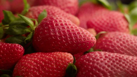 Beautiful strawberry falling and bouncing in slow motion Stock Footage 156202166