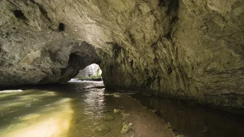 Beautiful Stream Flows Through Underground Cave With Flooded Path. Stock Footage