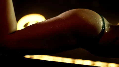 Beautiful Stripper demonstrating her perfect figure . Dancing on dark background Video stock 123230509