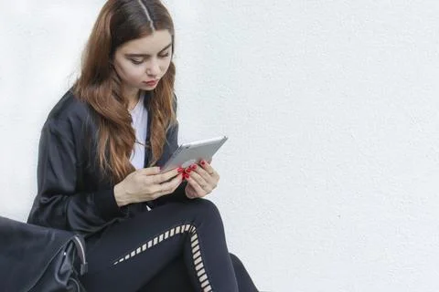 A beautiful student girl using a computer, laptop Stock Photos