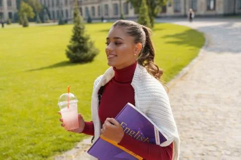 Beautiful student having a break between her lessons Stock Photos