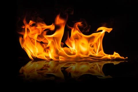 Beautiful stylish fire flames, close-up. Stock Photos