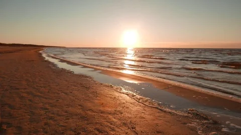 Beautiful summer beach during sunset Stock Footage 73832845