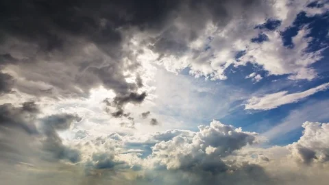 Beautiful summer day storm cloud timelapse with sunshine, Dramatic thunderstorm Stock Footage 78287354