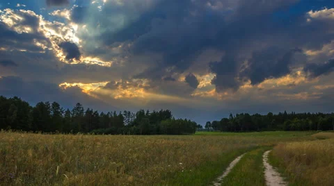Beautiful summer fields with storm weather, 4k timelapse Stock Footage 64757356