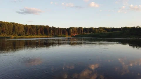Beautiful summer landscape. Reflection of trees in the water at sunrise. Stock Footage 136076852