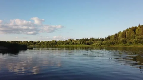 Beautiful summer landscape. Reflection of trees and sky in the water. Stock-Footage 136158890