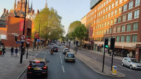 BEAUTIFUL SUMMER POV COMMUTING THROUGH CENTRAL LONDON KINGS CROSS UK 4K Stock Footage 242944980