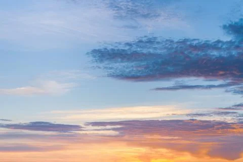 Beautiful summer sunset with clouds over the sea Stock Photos