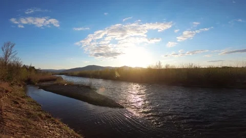 Beautiful summer sunset on a mountain river Stock Footage 142379326