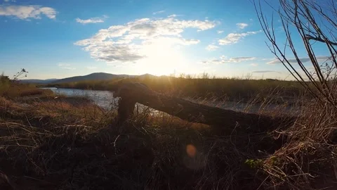 Beautiful summer sunset on a mountain river Stock Footage 142380065