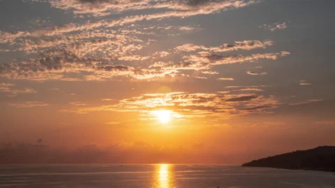 Beautiful summer sunset. Movement of clouds in the evening sky View from the Stock Footage 300829461