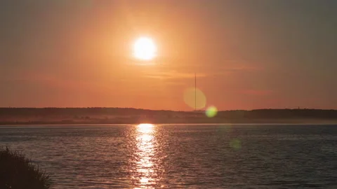 Beautiful summer sunset. View from the river embankment. Stock Footage 206076052