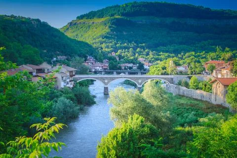 Beautiful summer view of the ancient bridge in Veliko Tarnovo, Bulgaria Stock Photos