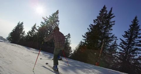 Beautiful Sun Flared Slow Motion 4k Of Skier Training Balance While Skiing Stock Footage 47098140