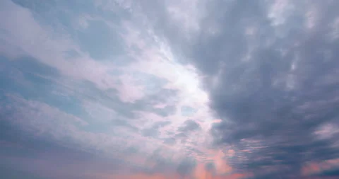 Beautiful sun rays in a colorful cloudy sky / Wide angle view Stock Footage 130987861