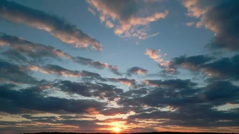 Beautiful sun setting behind a hill silhouette Video stock 334805062