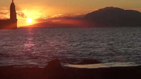 Beautiful sun setting on ocean Stock Footage 77805076