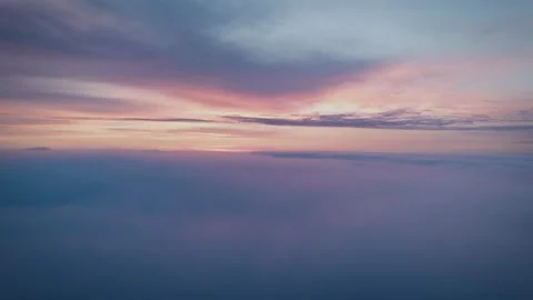 Beautiful Sunrise above a Cloud Layer Aerial 動画素材 345970205
