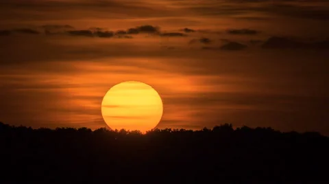 The beautiful sunrise against the cloud stream. Time lapse. Telephoto lens Stock Footage 64103525