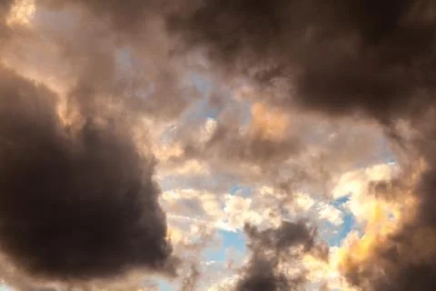 Beautiful sunrise and dramatic clouds on the sky. Stock Photos