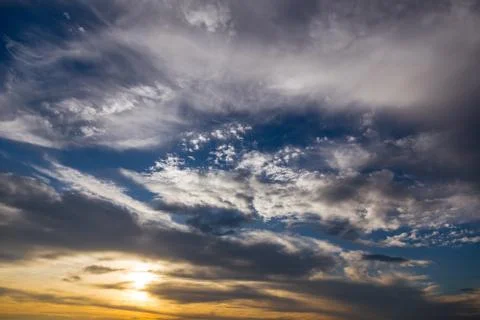 Beautiful sunrise and dramatic clouds on the sky Stock Photos