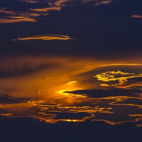 The beautiful sunrise on the background of the dark cloud. Time lapse Stock Footage 69449209