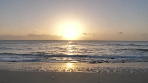 Beautiful Sunrise on Beach with waves lapping A Continuous Sequence Pt2 of 3 Stock Footage 242055908
