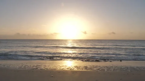 Beautiful Sunrise on Beach with waves lapping B Continuous Sequence Pt5 of 40 Video stock 242061560