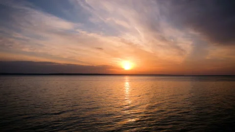 Beautiful sunrise at the beach, waves rolling. 4k shot Stock-Footage 89788539