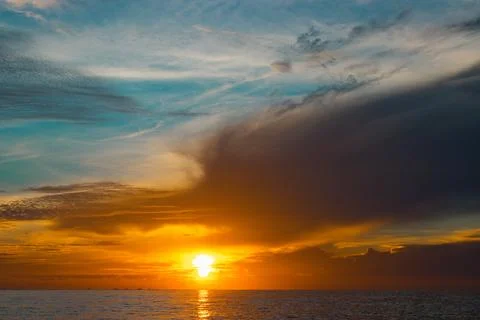 Beautiful sunrise with dramatic cloud and blue sky Stock Photos