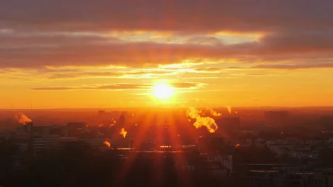 Beautiful sunrise light breaks through the hedge. Lubeck, Germany. Stock Footage 87729687