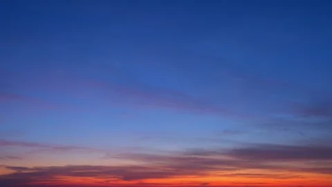 Beautiful sunrise sky with clouds in Time-lapse video.  Stock Footage 260174699