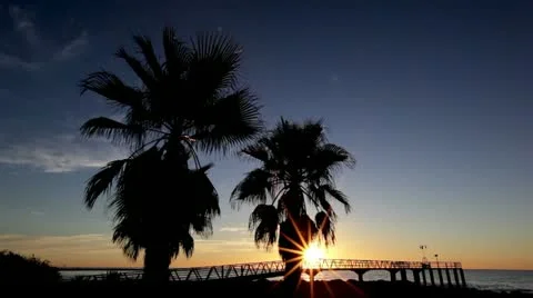 Beautiful sunrise at wooden gazebo Stock Footage