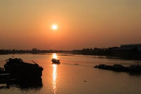 Beautiful sunset above the river Stock Photos