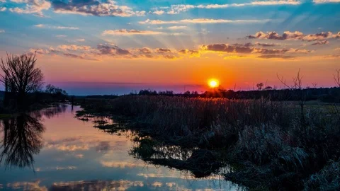Beautiful sunset against calm river Stock Footage 83588098