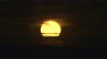 The beautiful sunset against the cloud. Real time capture. Telephoto lens 4k or 4k+ Resolution