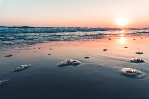Beautiful sunset and reflection view from above the sea. Close up shoot Stock Photos