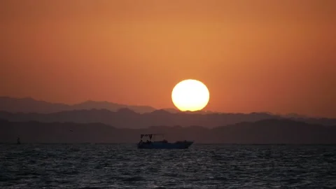 Beautiful sunset on the background of mountains and the Red sea, Egypt Stock Footage 162384932