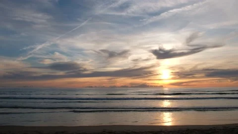 Beautiful sunset on the beach with clouds Stock Footage 170838739