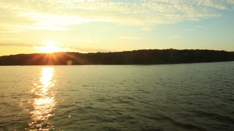 Beautiful sunset at the beach light beam shining through the cloudscape Stock Footage 42265780