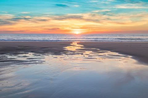 Beautiful sunset at the beach Stock Photos